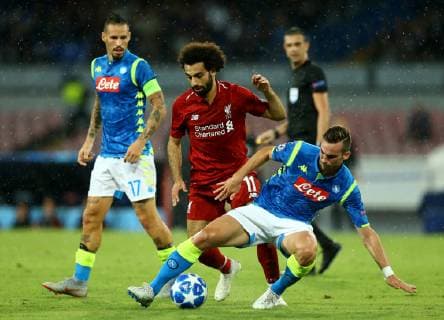 October 3, 2018 - Naples, Italy - SSC Napoli v FC Liverpool - UEFA Champions League Group C.Mohamed Salah of Liverpool between Marek Hamsik and Fabian Ruiz of Napoli at San Paolo Stadium in Naples, Italy on October 3, 2018. SSC Napoli v Liverpool - UEFA Champions League Group C  - ZUMAn230 20181003_zaa_n230_399 Copyright: xMatteoxCiambellix