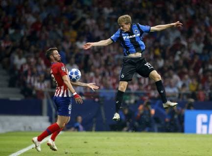 Partido de la Champions League disputado entre Atletico y Brujas. En la imagen, Saul y Thibault Vlietinck.Champions League match played between Atletico and Club Brugges. In this picture, Saul and Thibault Vlietinck. 