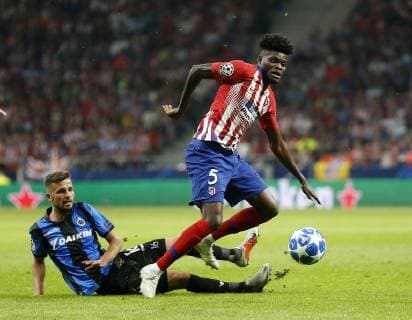 Partido de la Champions League disputado entre Atletico y Brujas. En la imagen, Thomas y Schrijvers.Champions League match played between Atletico and Club Brugges. In this picture, Thomas and Schrijvers. 