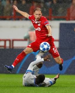 MOSCOW, RUSSIA - OCTOBER 03: Benedikt Howedes (top) of FC Lokomotiv Moscow and Breel Embolo of FC Schalke 04 vie for the ball during the Group D match of the UEFA Champions League between FC Lokomotiv Moscow and FC Schalke 04 at Lokomotiv Stadium on October 3, 2018 in Moscow, Russia. SPO, SOC, FOC 