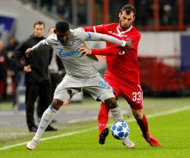 MOSCOW, RUSSIA - OCTOBER 03: Solomon Kverkvelia (R) of FC Lokomotiv Moscow and Breel Embolo of FC Schalke 04 vie for the ball during the Group D match of the UEFA Champions League between FC Lokomotiv Moscow and FC Schalke 04 at Lokomotiv Stadium on October 3, 2018 in Moscow, Russia. SPO, SOC, FOC 