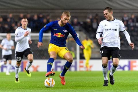 181004 Konrad Laimer or RB Leipzig and Djordje Denic of Rosenborg during the Europa League match between Rosenborg and RB Leipzig on October 4, 2018 in Trondheim Photo Jon Olav Nesvold BILDBYR N Code JE 160318  Copyright: JONxOLAVxNESVOLD BB181004JE006