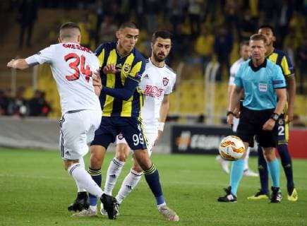 Eljif Elmas of Fenerbahce and Lukas Gressak 34 of Spartak Trnava during the UEFA Europa League Group D match between Fenerbahce and Spartak Trnava at Ulker Stadium in Istanbul , Turkey on October 04 , 2018 