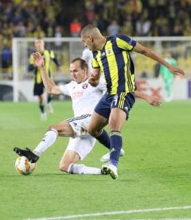 Islam Sliman of Fenerbahce and Martin Toth of Spartak Trnava during the UEFA Europa League Group D match between Fenerbahce and Spartak Trnava at Ulker Stadium in Istanbul , Turkey on October 04 , 2018 