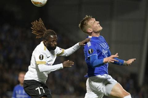 Genk s Dieumerci Ndongala and Sarpsborg s Joonas Tamm fight for the ball during a game of Belgian soccer team KRC Racing Genk against Norwegian Sarpsborg 08 FF, in Sarpsborg, Norway, Thursday 04 October 2018, on day two of the Europa League group stage in group I. YORICKxJANSENS  x05440799x