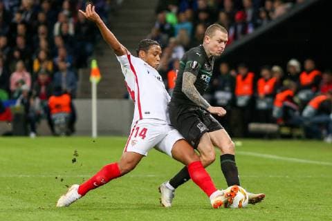 KRASNODAR, RUSSIA â€“ OCTOBER 4, 2018: Sevilla s Luis Muriel (L) and FC Krasnodar s Pavel Mamayev in action in their 2018 19 UEFA Europa League Group J Round 2 football match at Krasnodar Stadium. Vitaly Timkiv TASS  TS092935
