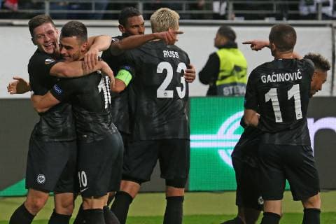 Soccer Europa League 02 Matchday Eintracht Frankfurt Lazio Rome on 04 10 2018 in the Commerzbank Arena in Frankfurt Jubilation Torjubel goalscorer Filip Kostic Frankfurt celebrates after his goal to 2 to 1 with Luka Jovic Frankfurt and Sebastien Haller Frankfurt embraces Marco Russ Frankfurt and points to Mijat Gacinovic Frankfurt MH