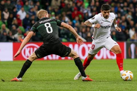 KRASNODAR, RUSSIA â€“ OCTOBER 4, 2018: FC Krasnodar s Yuri Gazinsky (L) and Sevilla s Ever Banega in action in their 2018 19 UEFA Europa League Group J Round 2 football match at Krasnodar Stadium. Vitaly Timkiv TASS  TS092959