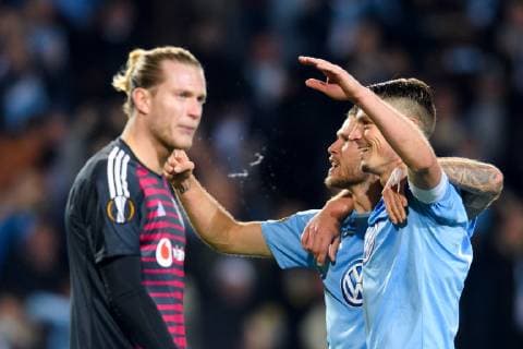181004 Goalkeeper Loris Karius of Besiktas looks dejected as Arn-Ingvi Traustason and Markus Rosenberg or Malmö FF celebrates after Markus Rosenberg or Malmö FF scores 2 0 during the Europe League group stage match between Malmö FF and Besiktas on October 4, 2018 in Malmö Photo Petter Arvidson BILDBYR N Code PA 92119  Copyright: PETTERxARVIDSON BB181004PA053