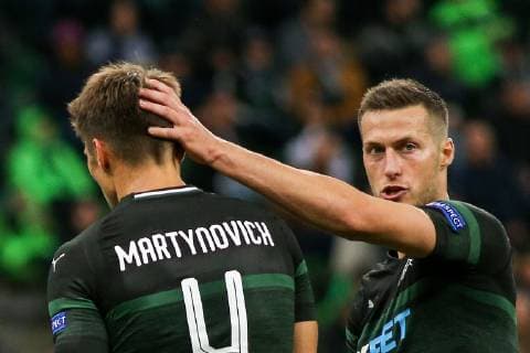 KRASNODAR, RUSSIA â€“ OCTOBER 4, 2018: FC Krasnodar s Alyaksandr Martynovich (L) and Uros Spajic celebrate scoring in their 2018 19 UEFA Europa League Group J Round 2 football match against Sevilla FC at Krasnodar Stadium. Vitaly Timkiv TASS  TS09295D