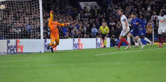 Football - 2018 2019 Europa League - Group L: Chelsea - MOL Vidi Alvaro Morata of Chelsea fires in his shot to score the only goal of the match ,past Vidi goalkeeper,Tomas Tujvel at Stamford Bridge. COLORSPORT ANDREW COWIE 