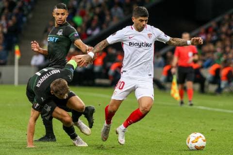 KRASNODAR, RUSSIA â€“ OCTOBER 4, 2018: FC Krasnodar s Alyaksandr Martynovich (L) and Sevilla s Ever Banega in action in their 2018 19 UEFA Europa League Group J Round 2 football match at Krasnodar Stadium. Vitaly Timkiv TASS  TS092963