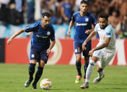(181005) -- NICOSIA, Oct. 5, 2018 -- Jordan Amavi (R) of Marseille vies with Facundo Pereyra of Apollon during the Europa League Group H match between Apollon and Marseille in Nicosia, Cyprus on Oct. 4, 2018. Apollon drew 2-2 with Marseille. ) (SP)CYPRIS-NICOSIA-SOCCER-UEFA EUROPA LEAGUE-APOLLON VS MARSEILLE SakisxSavvides 