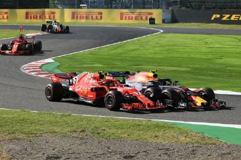 7th October 2018, Suzuka International Racing Course, Suzuka City, Japan; Formula One Grand Prix of Japan, race day; Scuderia Ferrari, Kimi Raikkonen pushed wide by Aston Martin Red Bull Racing TAG Heuer, Max Verstappen  ActionPlus12069099 Octane
