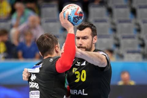 Andre Schmid Andy Schmid RNL 2 and Gedeon Guardiola RNL 30 duel duel tackle tackling dynamics action action while warming up before the match Handball Champions League Rhein Neckar Löwen IFK Kristianstad xozx