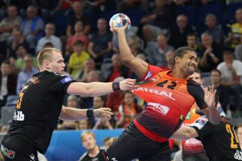 Rhein Neckar Loewen IFK Kristianstad Rhein Neckar Loewe Mads Mensah Larsen No 22 against Kristianstads Anar Freyr Arnarsson No 5 in the Champions League match Rhein Neckar Loewen IFK Kristianstad Mannheim 10 10 18 Handball Champions League Group Phase Mannheim Baden Wuerttemberg Germany SAP Arena