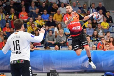Rhein Neckar Loewen IFK Kristianstad Rhein Neckar Loewe Bogdan Radivojevic No. 14 against Kristianstads Kappelin Richard Carl Johan playing in the Champions League Rhein Neckar Loewen IFK Kristianstad Mannheim 10 10 18 Handball Champions League Group Phase Mannheim Baden Wuerttemberg Germany SAP Arena