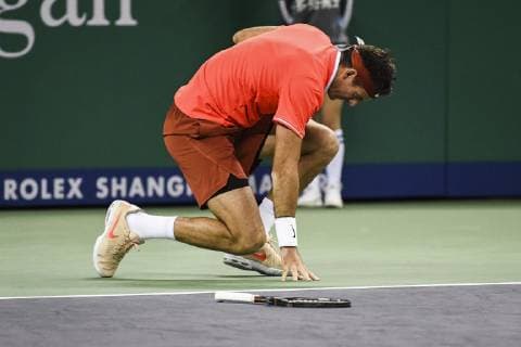 Juan Martin Del Potro of Argentina reacts as he competes against Borna Coric of Croatia in their third round match of the men s singles during the Rolex Shanghai Masters 2018 tennis tournament in Shanghai, China, 11 October 2018. Juan Martin del Potro hobbled out of the Shanghai Masters last 16 on Thursday after hurting his right knee in an awkward fall. The Argentine world number four, who had already been suffering with a virus, lost his footing at 5-5 in the first set against Croatia s Borna Coric. The 30-year-old Del Potro had lengthy treatment and strapping put on his knee, but conceded the match afterlosing the first set 7-5. It caps a miserable few days for the third seed, who lost Sunday s China Open final to unseeded Nikoloz Basilashvili and revealed that he had been under the weather during the upset. Juan Martin del Potro quits Shanghai injured after heavy fall 