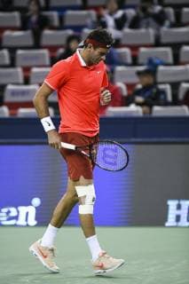 Juan Martin Del Potro of Argentina reacts as he competes against Borna Coric of Croatia in their third round match of the men s singles during the Rolex Shanghai Masters 2018 tennis tournament in Shanghai, China, 11 October 2018. Juan Martin del Potro hobbled out of the Shanghai Masters last 16 on Thursday after hurting his right knee in an awkward fall. The Argentine world number four, who had already been suffering with a virus, lost his footing at 5-5 in the first set against Croatia s Borna Coric. The 30-year-old Del Potro had lengthy treatment and strapping put on his knee, but conceded the match afterlosing the first set 7-5. It caps a miserable few days for the third seed, who lost Sunday s China Open final to unseeded Nikoloz Basilashvili and revealed that he had been under the weather during the upset. Juan Martin del Potro quits Shanghai injured after heavy fall  pbu882957_12