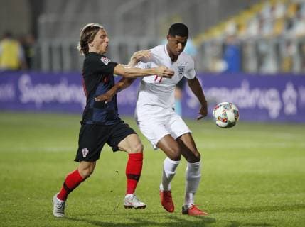 Luka Modric of Croatia tackles Marcus Rashford of England during the Uefa Nations League, Group A4 match at Stadion HNK Rijeka, Rijeka. Picture date: 12th October 2018. Picture credit should read: David Klein Sportimage EDITORIAL USE ONLY. No use with unauthorised audio, video, data, fixture lists, club league logos or live services. Online in-match use limited to 120 images, no video emulation. No use in betting, games or single club league player publications.