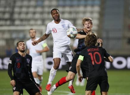 Raheem Sterling of England jumps up with Tin Jedvaj of Croatia during the Uefa Nations League, Group A4 match at Stadion HNK Rijeka, Rijeka. Picture date: 12th October 2018. Picture credit should read: David Klein Sportimage EDITORIAL USE ONLY. No use with unauthorised audio, video, data, fixture lists, club league logos or live services. Online in-match use limited to 120 images, no video emulation. No use in betting, games or single club league player publications.