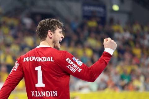 Niklas Landin Jacobsen Goalkeeper THW 1 clenching his fist cheers for a goal Jubilee Torjubel Goalkeeping celebrate the goal goal celebration Cheering over the goal optimistic Game scene Highlight Action Action Handball DKB Bundesliga Rhein Neckar Löwen THW Kiel xozx
