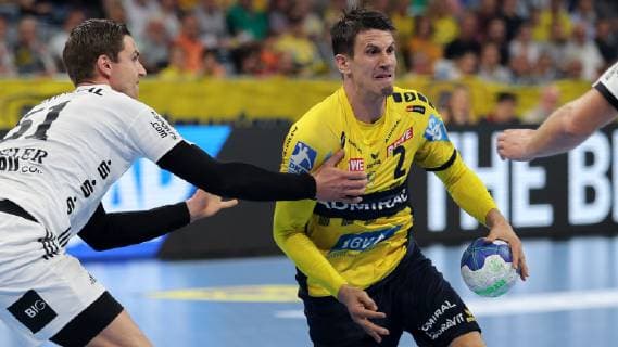 Hendrik Pekeler THW 61 Andre Schmid Andy Schmid RNL 2 Duel duel tackle tackling Dynamics Action Action Handball DKB Bundesliga Rhein Neckar Löwen THW Kiel xozx