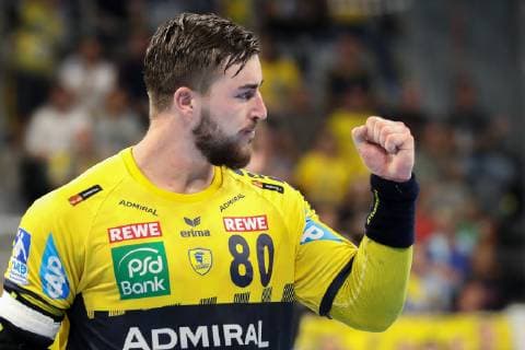 Jannik Kohlbacher RNL 80 clenched his fist cheers for a goal Jubilee Torjubel Goalkeeping celebrate the goal goal celebration Cheering over the goal optimistic Game scene Highlight Action Action Handball DKB Bundesliga Rhein Neckar Löwen THW Kiel xozx