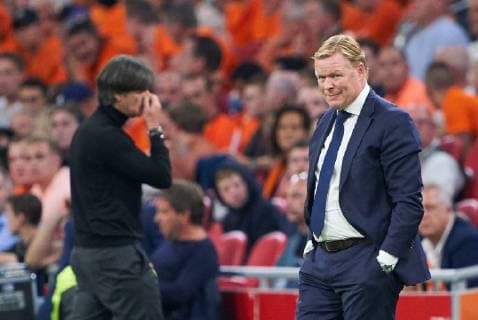 Netherlands-Germany , Soccer, Amsterdam, October 13, 2018 Ronald KOEMAN, NL Trainer smiles DFB headcoach Joachim Jogi LOEW, LÖW,sad, disappointed, angry, Emotions, disappointment, frustration, frustrated, sadness, desperate, despair, NETHERLANDS - GERMANY Football Nations League, Season 2018 2019, Amsterdam, Netherlands, October 13, 2018. Photographer: Peter Schatz MAGICS