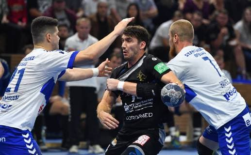 on the ball Gabriel De Santis Dresden left Phillip Jungemann Dessau right Libor Hanisch Dessau HC Elbflorenz Dresden vs Dessau Rosslauer HV 06 Handball 2 League of Men 2 Bundesliga Season 2018 2019 Dresden Ball Games ARENA Dresden 13 10 2018