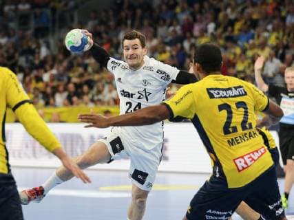 Mads Mensah Rhein Neckar Loewen 22 Miha Zarabec THW Kiel 24 Rhein Neckar Loewen THW Kiel 1 HBL Mannheim Copyright: xRoskaritzx Eibner-Pressefotox EP_kess_rrz