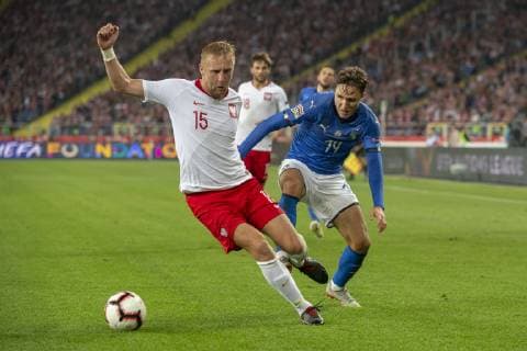 October 14, 2018 - Chorzow, Poland - Kamil Glik of Poland and Federico Chiesa of Italy during the UEFA Nations League A match between Poland and Italy at Silesian Stadium in Chorzow, Poland on October 14, 2018 Poland v Italy-UEFA Nations league  - ZUMAn230 20181014_zaa_n230_728 Copyright: xAndrewxSurmax