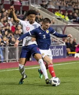16th October 2018, Tynecastle Park, Edinburgh, Scotland; UEFA U21 U 21 European Football Championships, qualification, Scotland versus England; Greg Taylor of Scotland and Reiss Nelson of England compete for possession  ActionPlus12070471 AlanxRennie