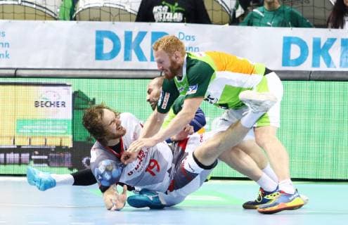 Timm Schneider Melsungen in a duel with Stefan Kneer Wetzlar in front and Joao Ferraz Wetzlar in the back HSG Wetzlar vs MT Melsungen Handball DHB Pokal 16 10 2018 HSG Wetzlar vs MT Melsungen Handball DHB Pokal 16 10 2018 Wetzlar Copyright: xEIBNER RenexWeissx EP_RWS