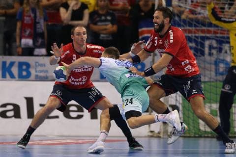 SG Flensburg Handewitt vs SC Magdeburg Handball DHB Cup Round of 16 17 10 18 Marko Bezjak SC Magdeburg 25 against Holger Glandorf SG Flensburg Handewitt 09 and Tobias Karlsson SG Flensburg Handewitt 03 xmmkx