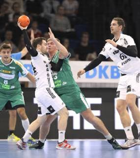 Photo Miha Zarabec vs. Franz Semper Green Leipzig Handball 1 Bundesliga Cup match on Wed 17 10 2018 THW Kiel DHfK Leipzig