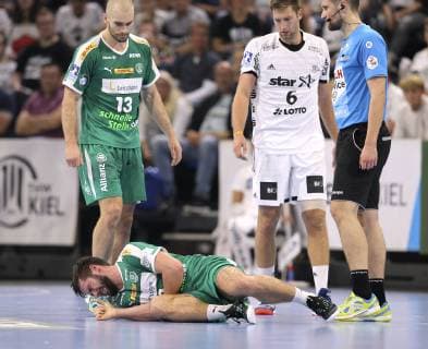 Photo losers Leipzig Lukas Binder on the ground Handball 1 Bundesliga Cup match on Wed 17 10 2018 THW Kiel DHfK Leipzig
