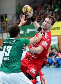 Germany Wuerzburg s Oliver Arena 17 10 2018 Handball DHB Pokal DJK Rimpar Woelfe HC Erlangen Photo v 1 Patrick Gempp DJK Rimpar Wolves 13 and Nikolai Link HC Erlangen 33 Copyright: HMBxMedia xHeikoxBecker