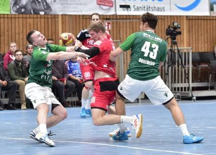 17 10 2018 Handball DHB Pokal Eighth finals season 2018 2019 DJK Rimpar Wolves HC Erlangen HCE OGo Fin Backs 41 DJK Rimpar Wolves Jan Schäffer 25 HC Erlangen HCE Benedikt Brielmeier 43 DJK Rimpar Wolves