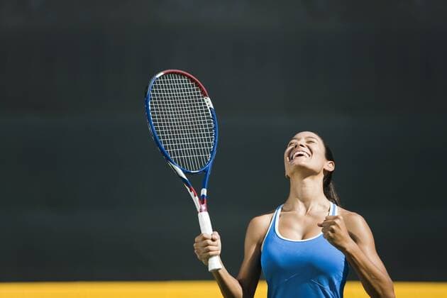Young female tennis player cheering, portrait  Copyright: SandroxDixCarloxDarsa B10113028