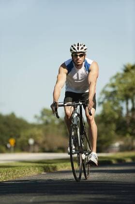 Man riding bicycle  Copyright: OdilonxDimier B37705929