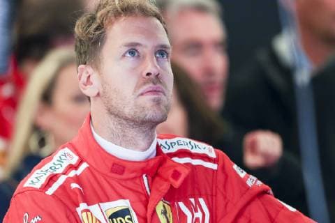 AUSTIN, TX - OCTOBER 18: Ferrari driver Sebastian Vettel (5) of Germany looks at track monitors during rain delay prior to afternoon practice for the F1 United States Grand Prix on October 18, 2018, at Circuit of the Americas in Austin, TX. (Photo by John Crouch Icon Sportswire) AUTO: OCT 18 F1 - United States Grand Prix Icon18101830671 EDITORIAL USE ONLY