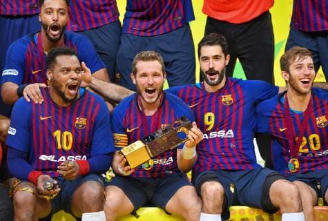 (181020) -- DOHA, Oct. 20, 2018 -- (From L to R FC Barcelona Barca s Cedric Sorhaindo, Victor Tomas Gonzalez, Raul Entrerrios Rodriguez and Aleix Gomez Abello celebrate with the trophy after winning the final match of the 2018 IHF Super Globe World Handball Club Championship against Fuchse Berlin in Doha, Capital of Qatar, Oct. 19, 2018. FC Barcelona won 29-24 to claim the title. ) (SP)QATAR-DOHA-HANDBALL-IHF-SUPER GLOBE-AWARDING CEREMONY Nikku 