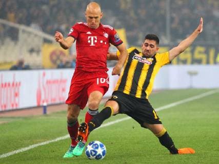 AEK Athens v Bayern Munich UEFA Champions League Tasos Bakasetas of AEK Athens and Arjen Robben of Bayern Munich during the UEFA Champions League match at Olympic Stadium, Athens Content Not Available For UK Newspapers Copyright: xYannisxHalasx FIL-12443-0029