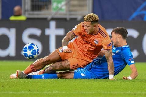 Memphis Depay Olympique Lyon and Florian Grillitsch TSG 1899 Hoffenheim Germany Sinsheim 23 10 2018 Sport Soccer UEFA Champions League Matchday 3 TSG 1899 Hoffenheim vs Olympique Lyon Rhein Neckar Arena DFL DFB REGULATIONS PROHIBIT ANY USE OF PHOTOGRAPH AS IMAGE SEQUENCES AND OR QUASI VIDEO
