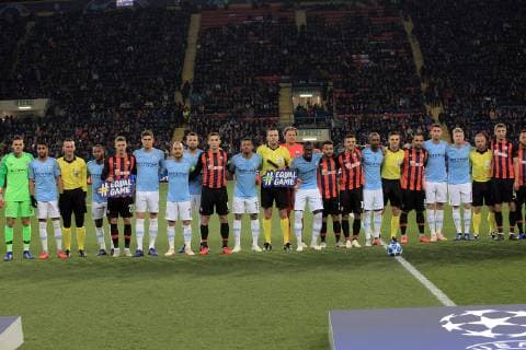 Referees, players of FC Shakhtar Donetsk (orange and black kit) and Manchester City FC (blue kit) pose for a photo as they promote the Equal Game campaign before the UEFA Champions League Group F Matchday 3 game at the Metalist Stadium Regional Sports Complex, Kharkiv, northeastern Ukraine, October 23, 2018. Ukrinform. KDR UCL: Shakhtar vs. Manchester City in Kharkiv  Copyright: xVyacheslavxMadiyevskyyx