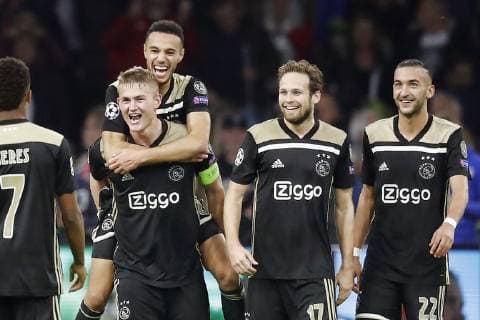 AMSTERDAM, Stadium Johan Cruyff Arena 23-10-20-18, football, season 2018 2019, Football Champions League . Ajax player Noussair Mazraoui and Ajax player Matthijs de Ligt (L) celebrating the 1-0 win after the game Ajax - Benfica . Ajax - Benfica  x2562897x