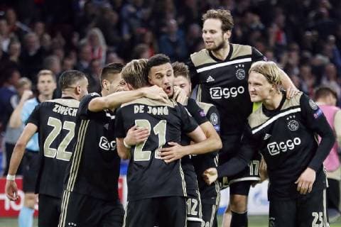 AMSTERDAM, Stadium Johan Cruyff Arena 23-10-20-18, football, season 2018 2019, Football Champions League . Ajax player Noussair Mazraoui (C) celebrating his 1-0 with Ajax player Frenkie de Jong (L) and Ajax player Daley Blind and Ajax player Kasper Dolberg (R) during the game Ajax - Benfica (1-0). Ajax - Benfica  x2562900x