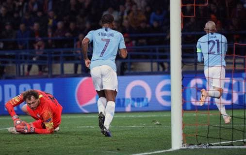 Fußball, CL, Schachtar Donezk - Manchester City Goalkeeper Andrii Piatov (L) of FC Shakhtar Donetsk lies on the pitch as midfielder Raheem Sterling of Manchester City FC jogs past during the UEFA Champions League Group F Matchday 3 game at the Metalist Stadium Regional Sports Complex, Kharkiv, northeastern Ukraine, October 23, 2018. Ukrinform. UCL: Shakhtar vs. Manchester City in Kharkiv  Copyright: xDanilxShamkinx