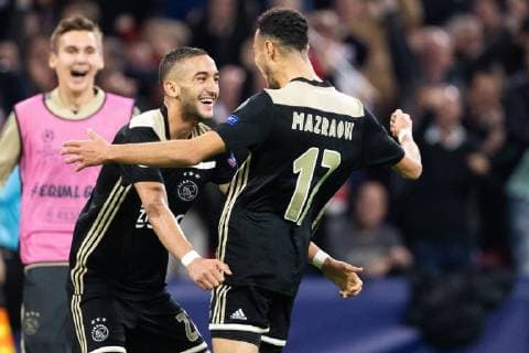 Hakim Ziyech of Ajax, Noussair Mazraoui of Ajax during the UEFA Champions League group E match between Ajax Amsterdam and SL Benfica at the Johan Cruijff Arena on October 23, 2018 in Amsterdam, The Netherlands UEFA Champions League 2018 2019 xVIxVIxImagesx xTomxBodexMultimediaxIVx 12541950